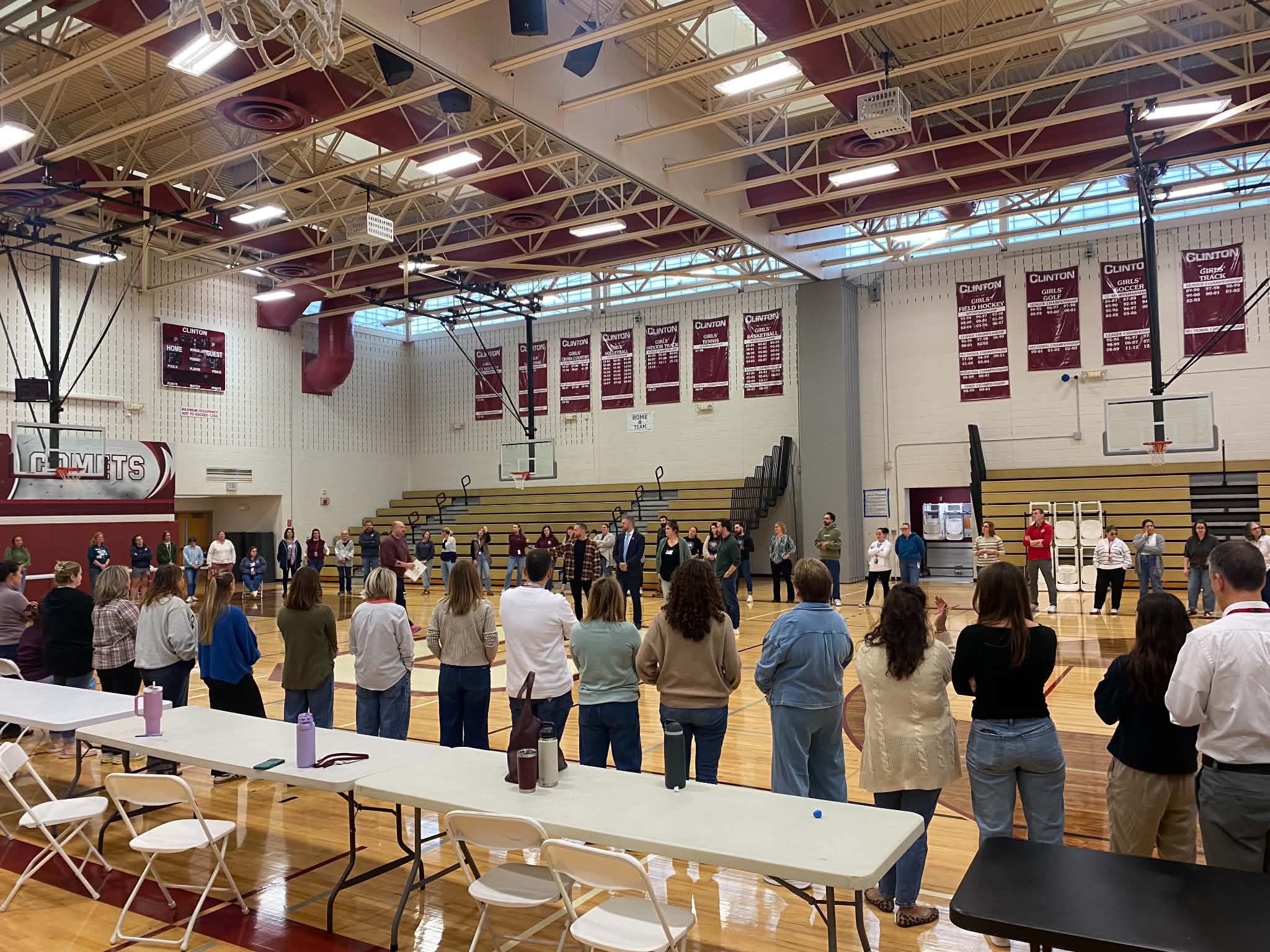 Participants at the Clinton High School poverty simulation